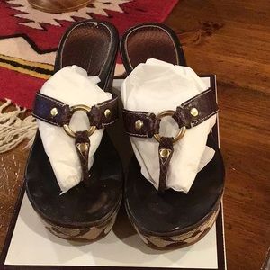 Coach Dark Brown Evita Printed Python Sandal.